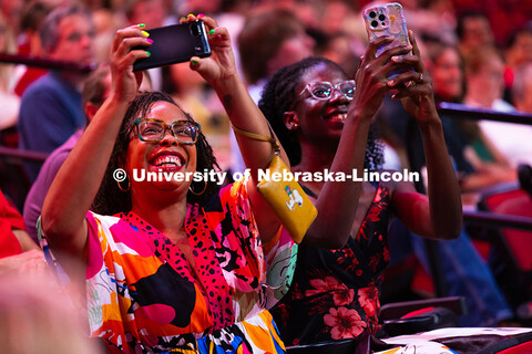 Genese Clark, a 2025 doctoral graduate, and Francisca Lawson Tettevie, a doctoral student, cheer for