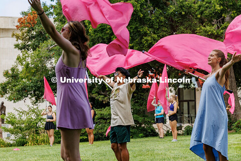 Perah Connelly, Josh Ronquillo and Velicity Sundling (left to right) practice the Cornhusker Marchin