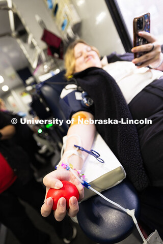 Allyson Hale, a first-year student in global studies, reads a comic while preparing to donate blood.