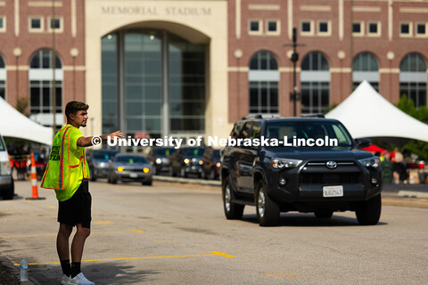 Davi Frota, a member of the student move-in team and a student at York University, helped direct tra