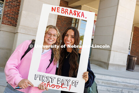 Sophomore, Julia Killgore (left), and Senior, Hailey Gust, pose for their first day of school portra