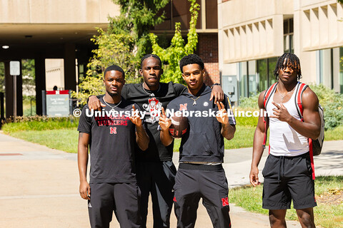 Ashriel Dixon, Desire Tonye Nyemeck, Amare Sanders and Brice Turner pose for a photo outside of Love