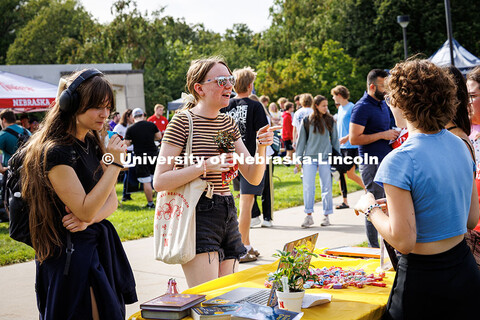 Juniors, Jessica Hays (left) and Jessica Adkins, chat with members of the Presentation Club at their