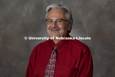 Studio portrait of Dan Claes, Professor and Acting Chairperson in the Department of Physics and Astr
