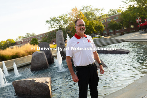 Portrait of Jon Jenkin, facility manager, stands in front of Broyhill Fountain. Jenkin manages the N