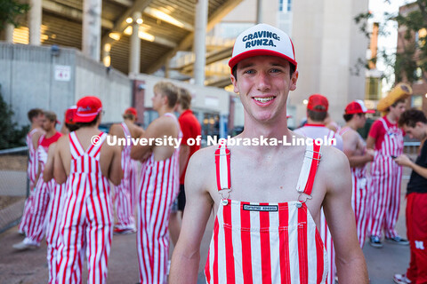 Tom Dey, senior marketing major, poses for a portrait outside Memorial Stadium. Tom is the captain o
