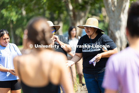 Angel Hinzo, Assistant Professor of History, speaks to students, staff and faculty before they begin