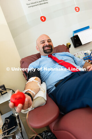 Tony Lazarowicz, director of academic advising for the College of Arts and Sciences, donates blood a