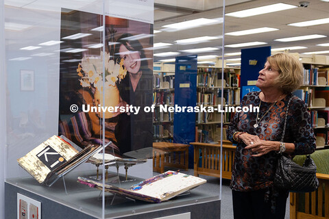Jeanne Clinker, a 1970 UNL graduate and high school classmate of Karen Blessen, walks through her fr