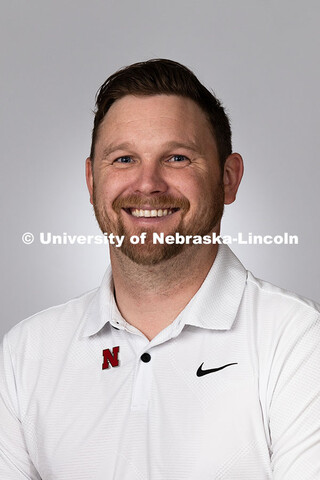 Studio portrait of Adam Christiansen, Academic Navigator in the Explore Center. June 24, 2025. 