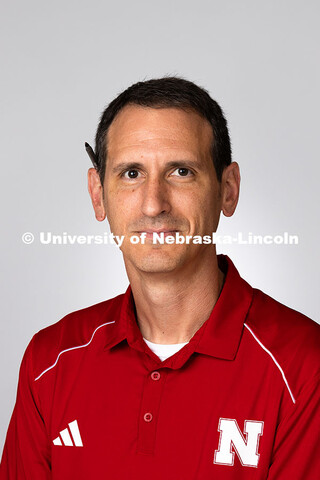 Studio portrait of Parker Reed, Academic Navigator in the College of Business and the College of Arc