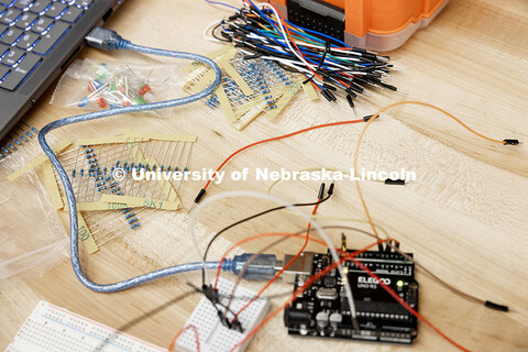 Wires and circuit boards lay on a desk inside the Scott Engineering Center. September 12, 2025. 