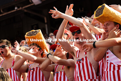 Friends and student section hype leaders Toby Ekdale, Dominic Dicarlo, Tom Dey and Landen Oppliger a