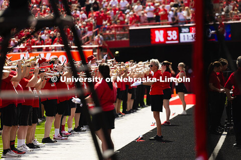 Diane Frost (second from left) returned to the field in Memorial Stadium for the first time since 19