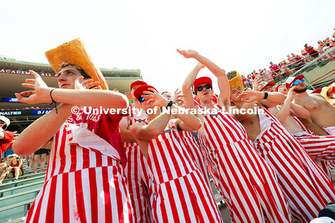 Friends and student section hype leaders Toby Ekdale, Dominic Dicarlo, Tom Dey and Landen Oppliger c