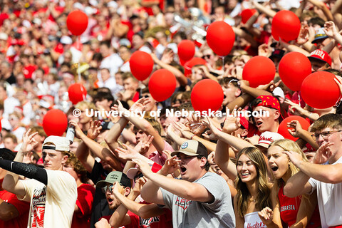 The student section cheers on the Huskers during the first quarter of the game against the Universit