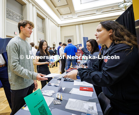 Michael Brown, a junior mechanical engineering major, talks to a representative from the Union Pacif