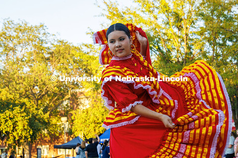 Dancers from the Sangre Azteca Dance Group perform a folkloric dance for attendees of the Fiesta on 