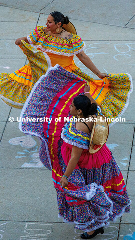 Dancers from the Sangre Azteca Dance Group perform a folkloric dance for attendees of the Fiesta on 