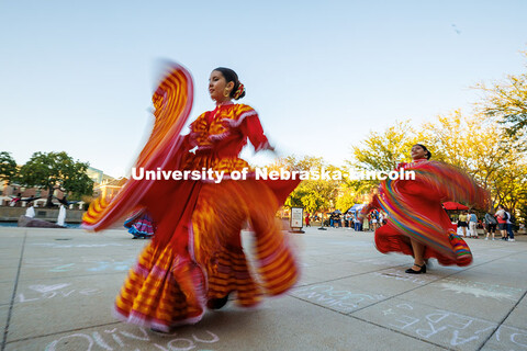 Dancers from the Sangre Azteca Dance Group perform a folkloric dance for attendees of the Fiesta on 