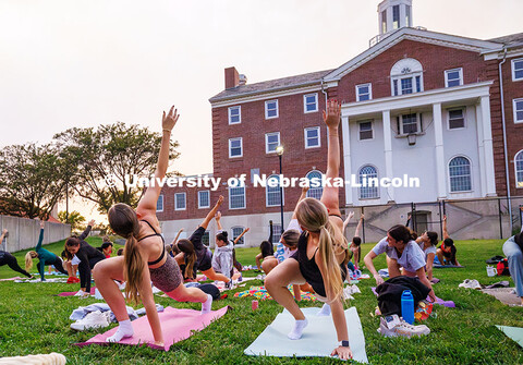 Students perform a lunge-sequence during the Pilates Pop-Up event held by Campus Rec at the 17th Str