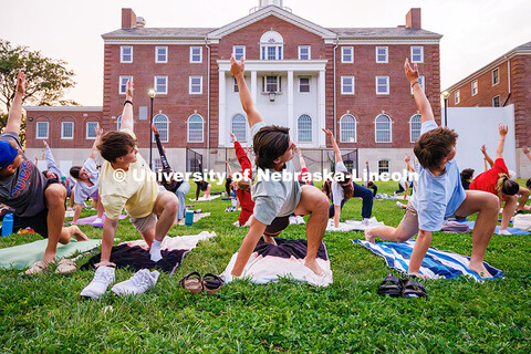 Students perform a lunge-sequence during the Pilates Pop-Up event held by Campus Rec at the 17th Str