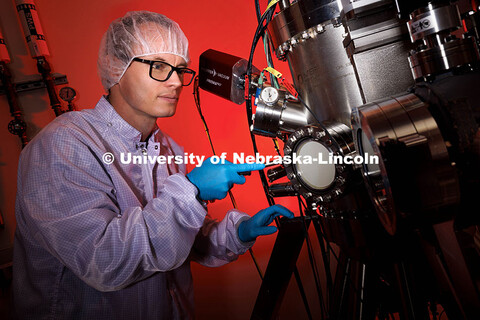 Robert Streubel, Assistant Professor of Physics and Astronomy, transfers samples in an ultrahigh vac