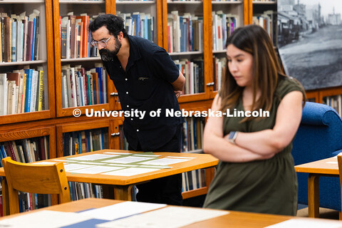 Gabe Bruguier, Assistant Professor for University Libraries, views copies of letters typed by author
