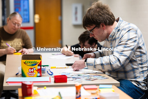 Will Dewey, a programmer with the Center for Digital Research in the Humanities, makes a collage fro