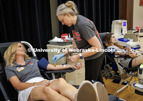 Shelley Zaborowski, the Associate Director of the Alumni Association, prepares to donate blood. Crys