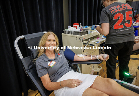Shelley Zaborowski, the Associate Director of the Alumni Association, donates blood for the We Give 