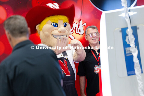 Donald Puckett, who has worked on UNL's custodial services team for 50 years, poses for a photo with
