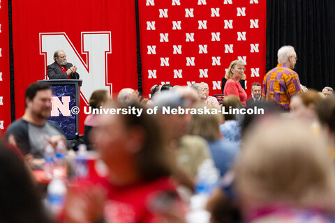 Staff and faculty stand to be recognized for 35 years of service during the Celebration of Service l