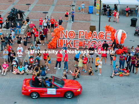 Aerial view of the Husker community as they watch the Homecoming Parade outside Memorial Stadium. Ho