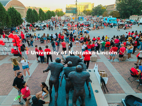 Aerial view of the Husker community as they watch floats go by in the east stadium loup drive during
