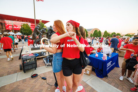 Seniors Kalyssa Williams (left) and Tristen Bradbury dance in the 360 Touch Booth during Cornstock. 