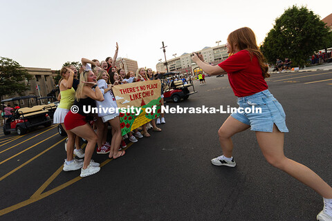 Chi Omegas pose in East Stadium Drive after finishing the Homecoming Parade route. Homecoming parade