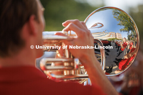 Members of the Cornhusker Marching Band warm up before the parade. 2025 Homecoming Parade. October 3