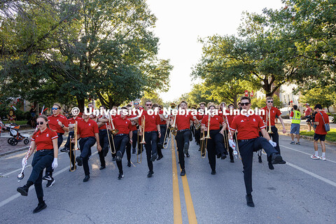 Members of the Cornhusker Marching Band dance as the homecoming parade begins. 2025 Homecoming Parad