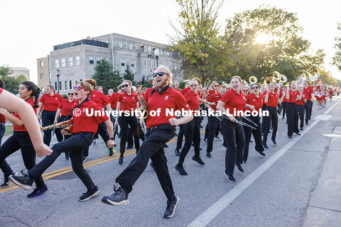 Members of the Cornhusker Marching Band dance as the homecoming parade begins. 2025 Homecoming Parad