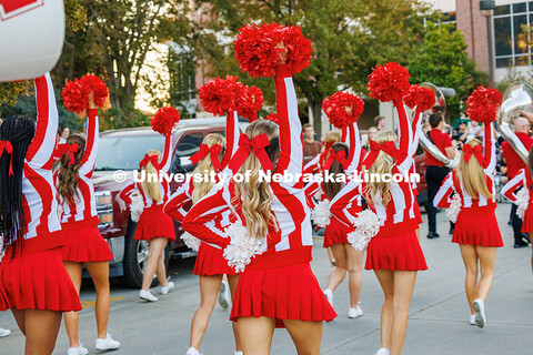 The Nebraska Spirit Squad marches in the Homecoming 2025 parade. Homecoming parade and Cornstock. Oc