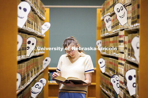 Kelsie Jackson, third-year student in the College of Law, is joined by the ghosts of past students w