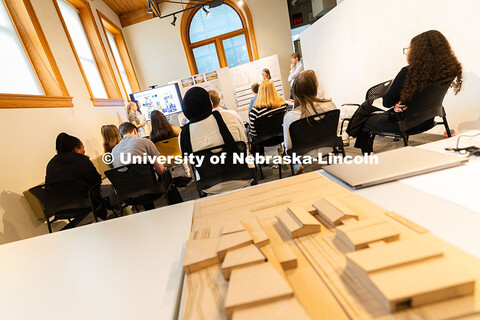 A model of a high school sits at the back of the west gallery space in the College of Architecture. 