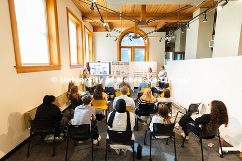 Students in the senior architecture and interior design co-lab present their mid-term projects to fa