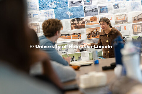 Sierra Elste, a third-year architecture student, speaks to her classmates during their mid-term pres