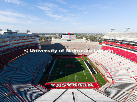 Graphics commemorate Johnny Carson's 100th birthday on the screens in Memorial Stadium. October 16, 