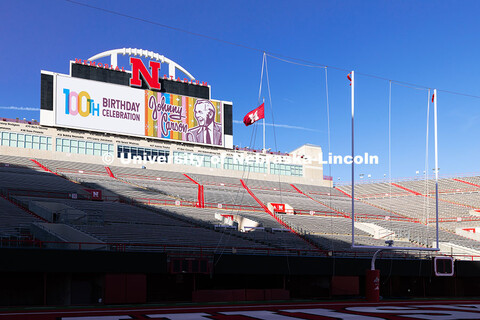 Graphics commemorate Johnny Carson's 100th birthday on the screens in Memorial Stadium. October 16, 