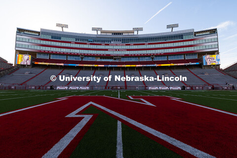Graphics commemorate Johnny Carson's 100th birthday on the screens in Memorial Stadium. October 16, 