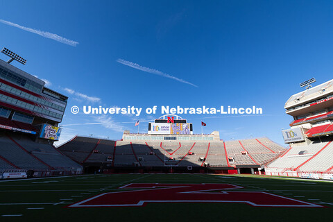 Graphics commemorate Johnny Carson's 100th birthday on the screens in Memorial Stadium. October 16, 
