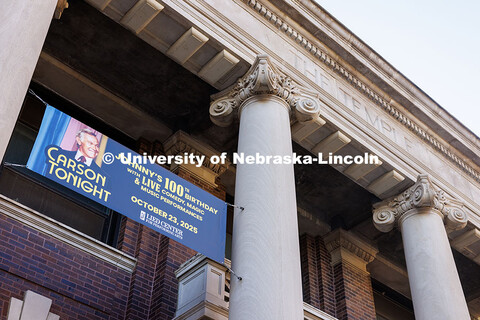 A banner advertising Carson Tonight hangs from the Temple Building. The event celebrates University 